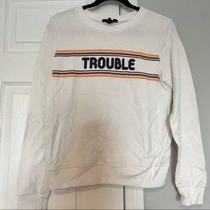 White “Trouble” long sleeve top